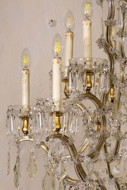 Lampadario in ferro battuto e vetro. | Lo Stile Italiano