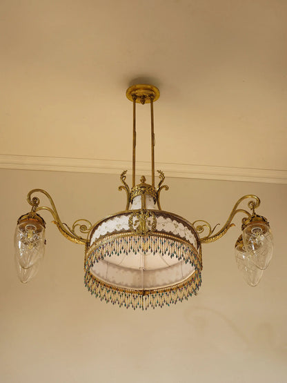 Lampadario Liberty decorato con medaglioni.| Lo Stile Italiano