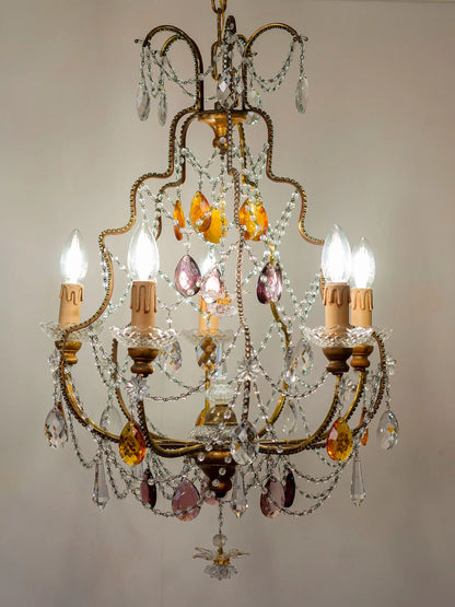 Lampadario con struttura in ferro dorato e decorazioni floreali centrali | Lo-Stile-Italiano