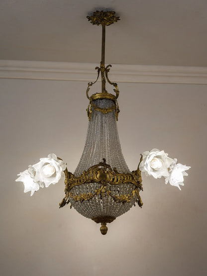 Lampadario stile Luigi XV con influenze Rococò in bronzo cesellato e dorato | Lo Stile Italiano