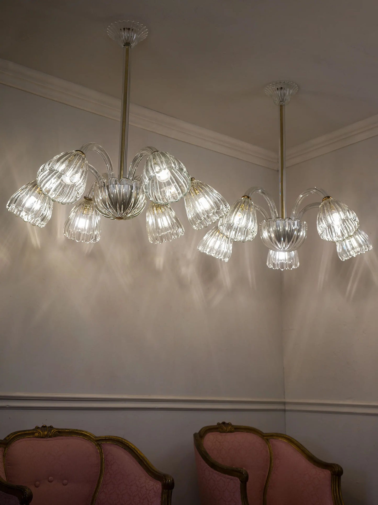 Coppia di lampadari Murano trasparenti con bracci in vetro soffiato | Lo Stile Italiano 