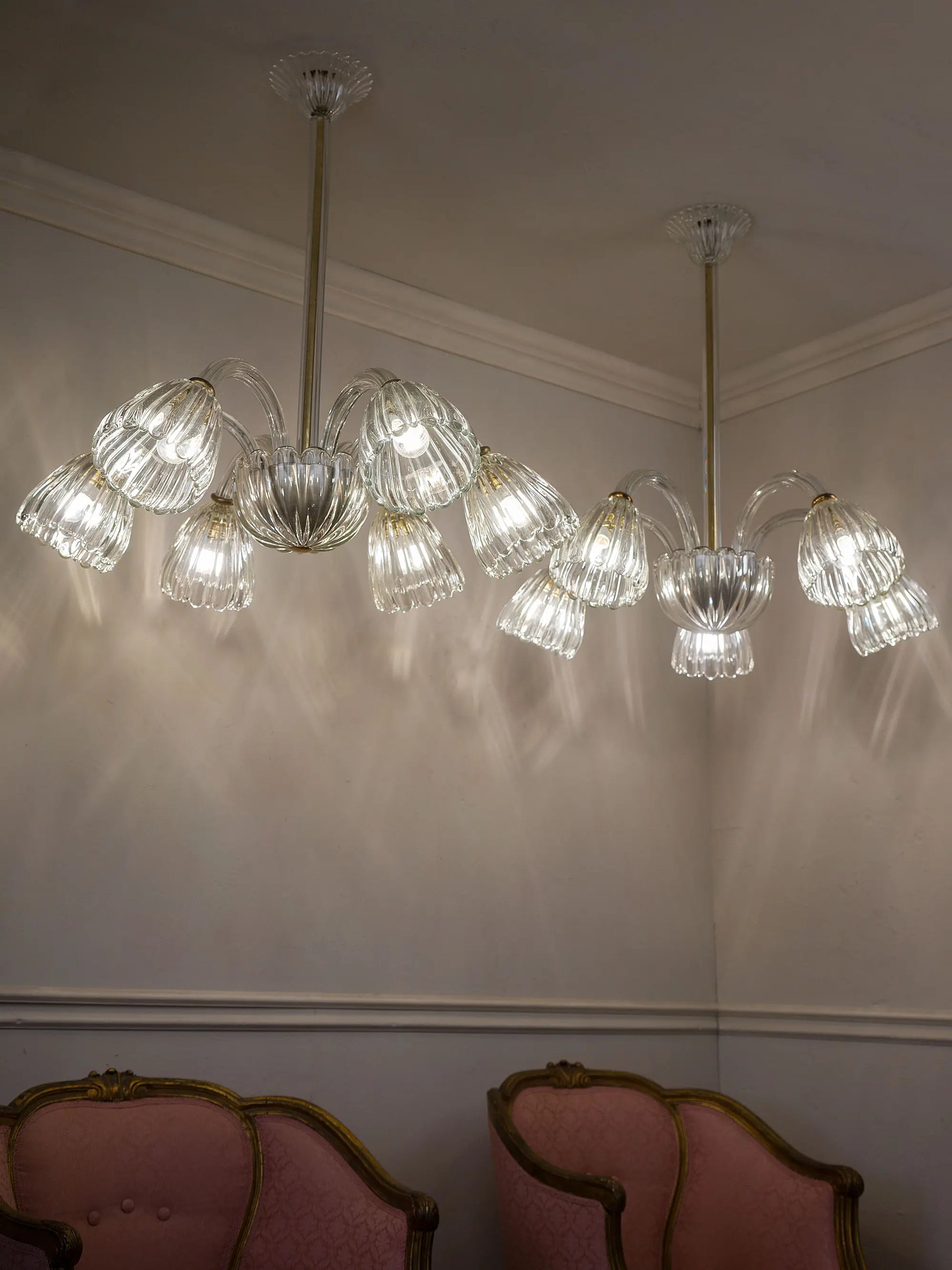 Coppia di lampadari Murano trasparenti con bracci in vetro soffiato | Lo Stile Italiano 