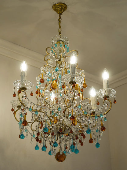 Lampadario fiorentino con pendenti in vetro di Murano turchese e ambra su struttura in ferro dorato – Lo Stile Italiano