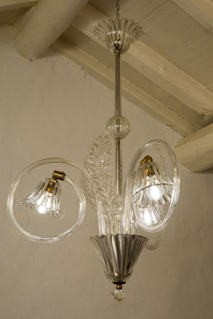 Lampadario antico in vetro di murano con bracci arrotolati, tre coppe effetto Rigadin.-Lo stile Italiano