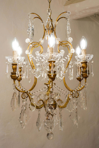 Lampadario Vintage a sei candele con placche in vetro e cristallo. | Lo Stile Italiano