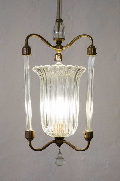 Lampadario Art Deco con lunga coppa centrale sorretta da 3 bracci di vetro| Lo Stile Italiano